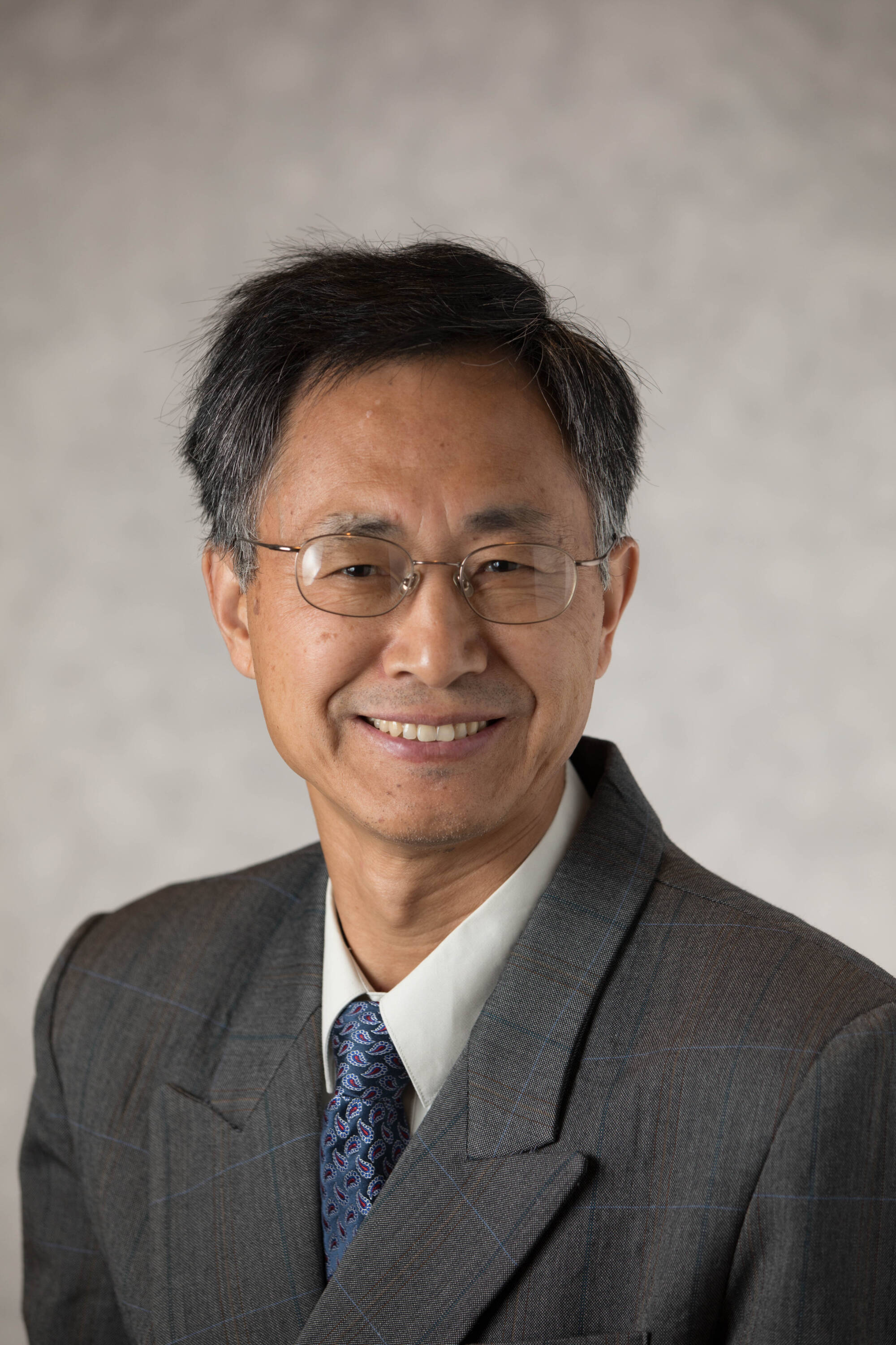 Xinli Wang